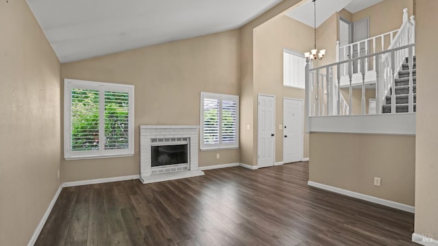 3087 Pecan Cir, Fairfield, CA 94533 - unfurnished living room featuring a notable chandelier, baseboards, and dark wood-style floors