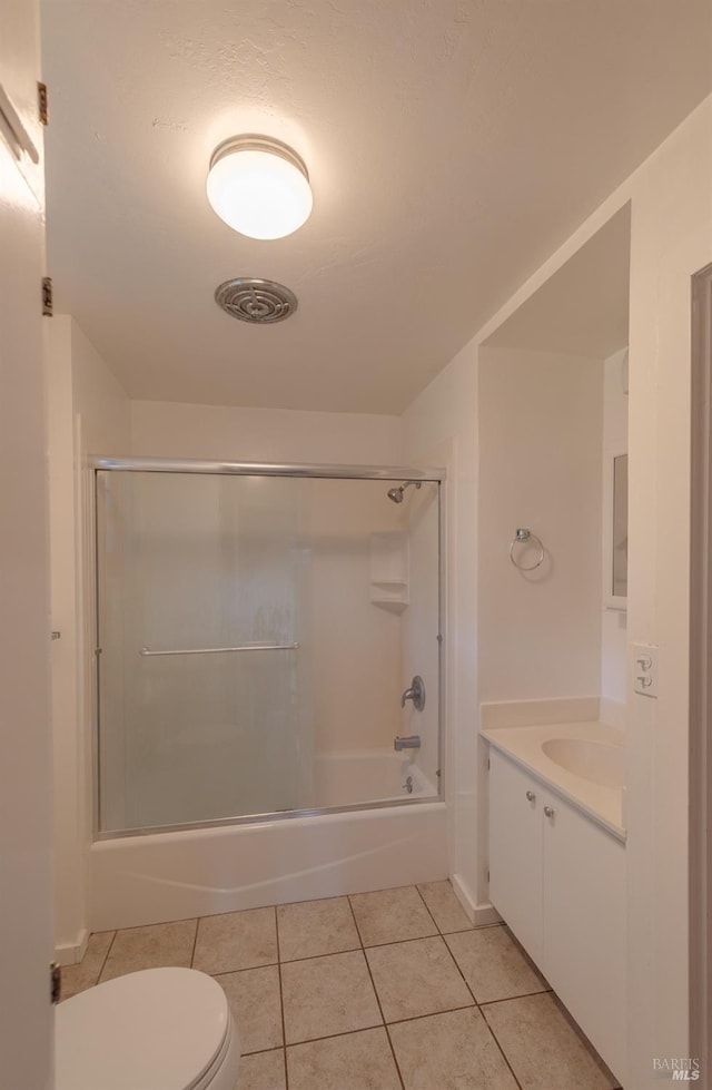 104 Rose Ln, Napa, CA 94574 - bathroom featuring toilet, vanity, visible vents, tile patterned flooring, and combined bath / shower with glass door