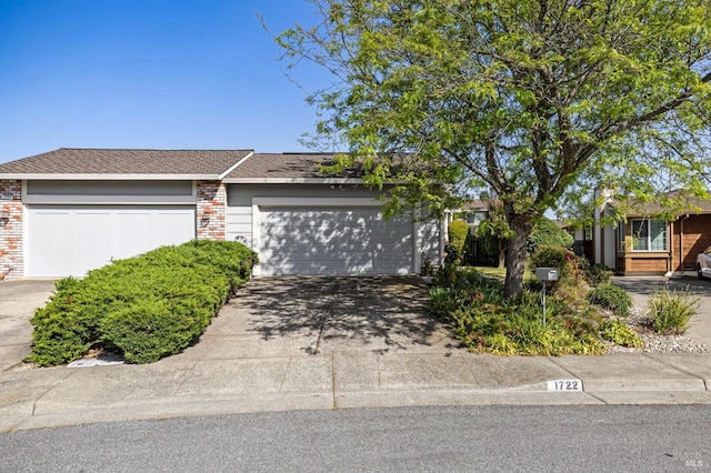 1722 Capella Ct, Petaluma, CA 94954 - view of front of property featuring driveway, a garage, and brick siding