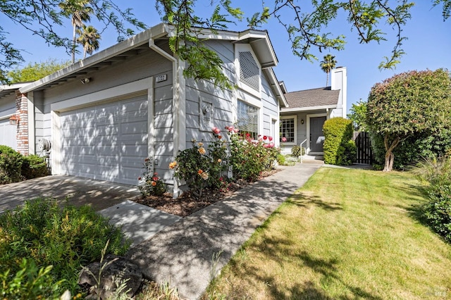 1722 Capella Ct, Petaluma, CA 94954 - view of front of home with a front yard, concrete driveway, a chimney, and a garage