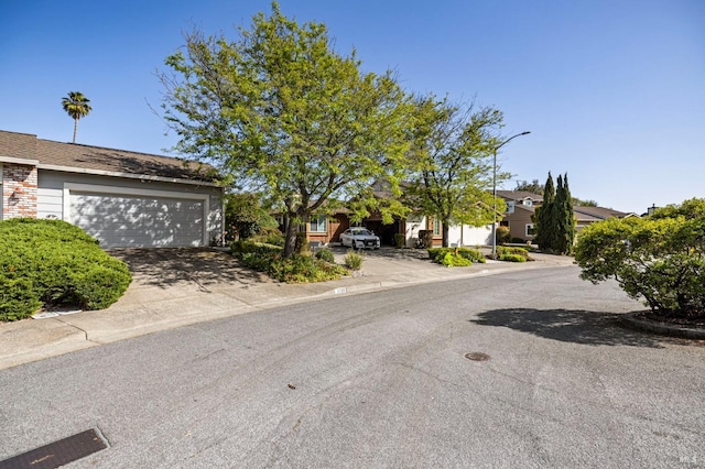 1722 Capella Ct, Petaluma, CA 94954 - view of front facade featuring a garage, driveway, and a residential view