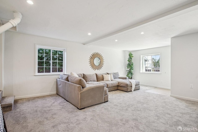 carpeted living room with recessed lighting, baseboards, and beamed ceiling