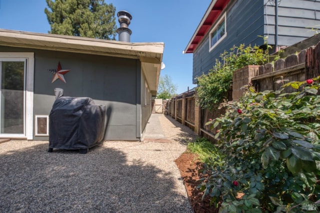 view of home's exterior with a fenced backyard