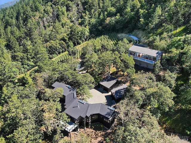 drone / aerial view with a view of trees