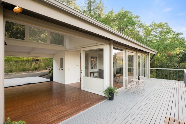 deck featuring a sunroom