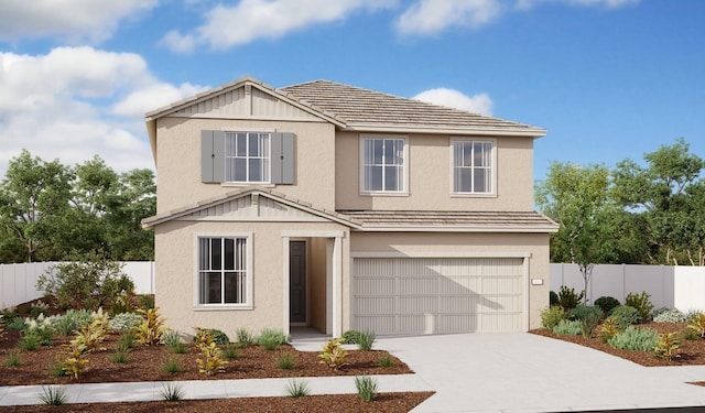 traditional-style home featuring driveway, stucco siding, an attached garage, and fence