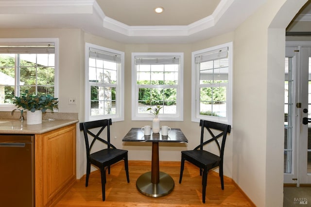 2555 Edgewater Dr, Napa, CA 94558 - interior space with arched walkways, light wood-style floors, a tray ceiling, and ornamental molding