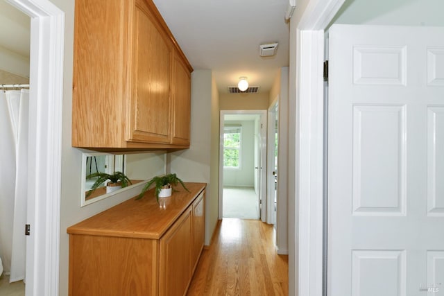 2555 Edgewater Dr, Napa, CA 94558 - hallway featuring light wood-style flooring and visible vents