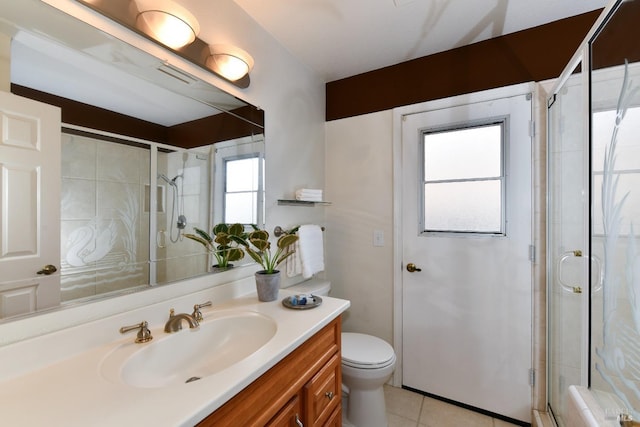 2555 Edgewater Dr, Napa, CA 94558 - bathroom with a stall shower, tile patterned flooring, vanity, and toilet