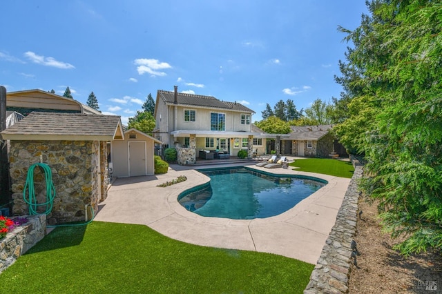2555 Edgewater Dr, Napa, CA 94558 - pool with a patio area, a lawn, an outbuilding, and a storage unit
