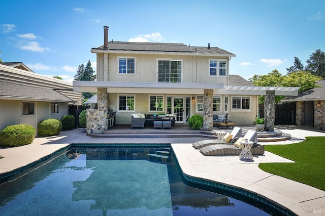2555 Edgewater Dr, Napa, CA 94558 - back of property featuring a patio, outdoor lounge area, stucco siding, a pergola, and an outdoor pool