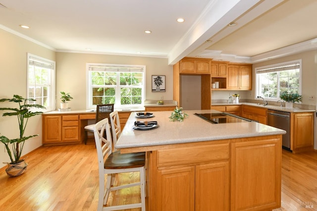 2555 Edgewater Dr, Napa, CA 94558 - kitchen with black electric stovetop, plenty of natural light, light wood-style flooring, and stainless steel dishwasher