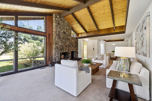1851 Vallejo St, Saint Helena, CA 94574 - carpeted living room with high vaulted ceiling, visible vents, beamed ceiling, wood ceiling, and a stone fireplace