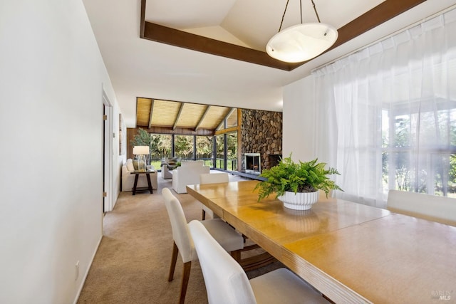 1851 Vallejo St, Saint Helena, CA 94574 - dining room with vaulted ceiling, light colored carpet, and a fireplace