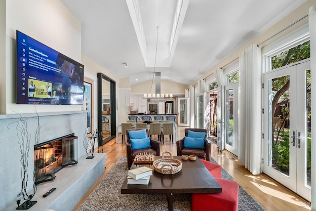 interior space featuring a chandelier and french doors