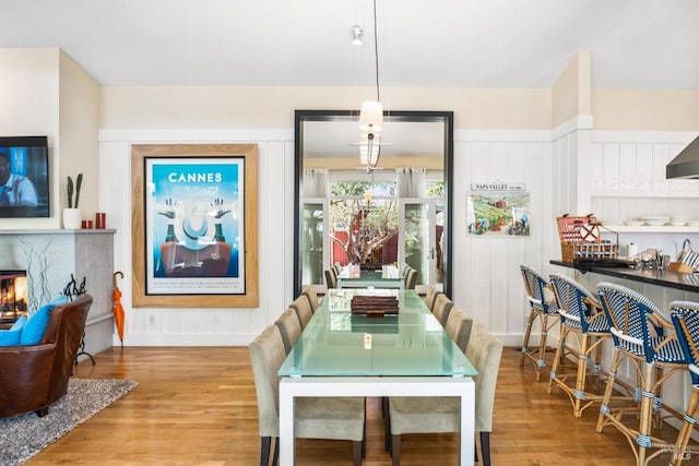 dining space featuring wood finished floors