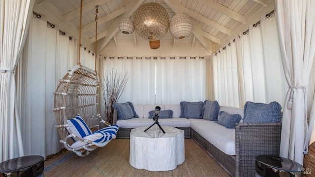 living room with wood ceiling and vaulted ceiling with beams