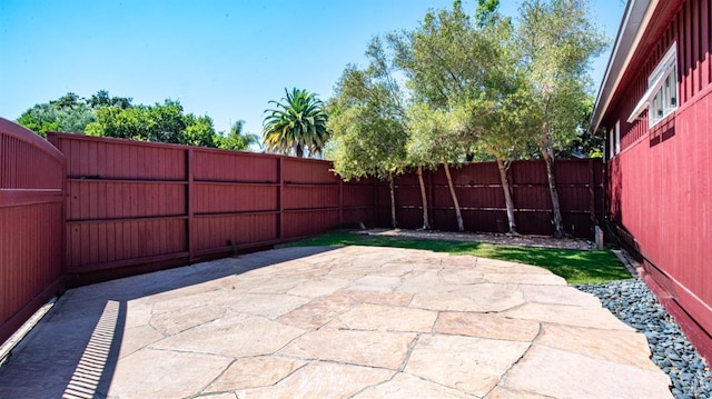 view of patio with a fenced backyard