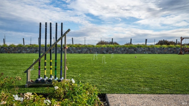 surrounding community featuring fence