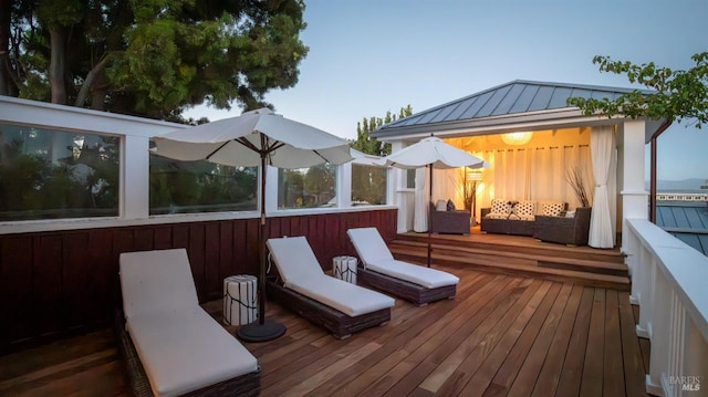 wooden deck with outdoor lounge area