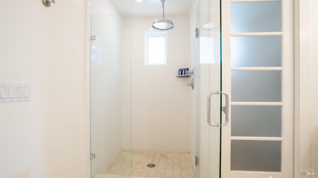 bathroom featuring a shower stall