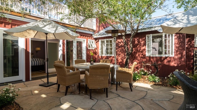view of patio featuring outdoor dining area