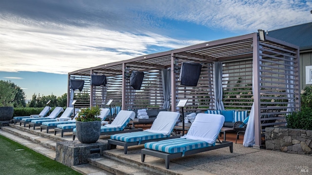 view of patio featuring an outdoor hangout area and a pergola