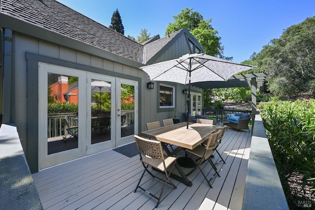 wooden terrace featuring an outdoor hangout area, outdoor dining space, and french doors