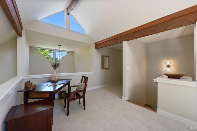 dining room with light carpet, baseboards, and lofted ceiling with beams