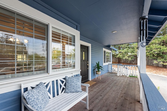 wooden deck featuring fence
