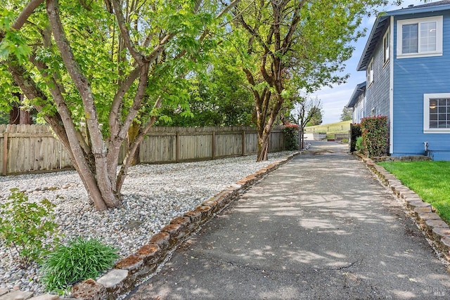 view of road with driveway