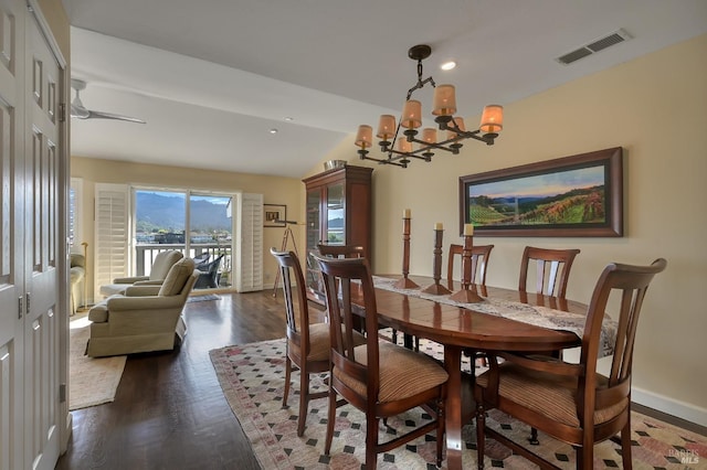 dining space with a notable chandelier, recessed lighting, baseboards, dark wood finished floors, and visible vents