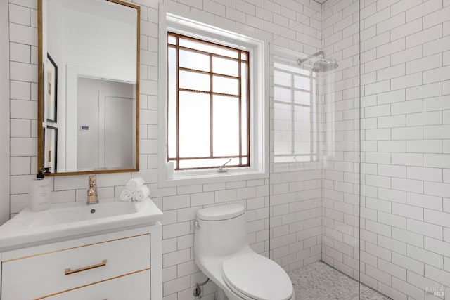 1071 Bale Ln, Calistoga, CA 94515 - full bathroom featuring tiled shower, plenty of natural light, toilet, vanity, and tile walls