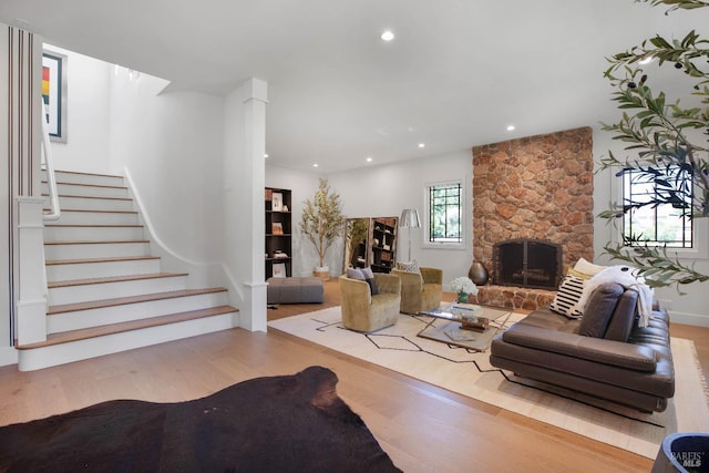 1071 Bale Ln, Calistoga, CA 94515 - living room featuring wood finished floors, a fireplace, stairway, baseboards, and recessed lighting