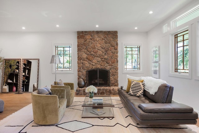 1071 Bale Ln, Calistoga, CA 94515 - living room with wood finished floors, a stone fireplace, and recessed lighting