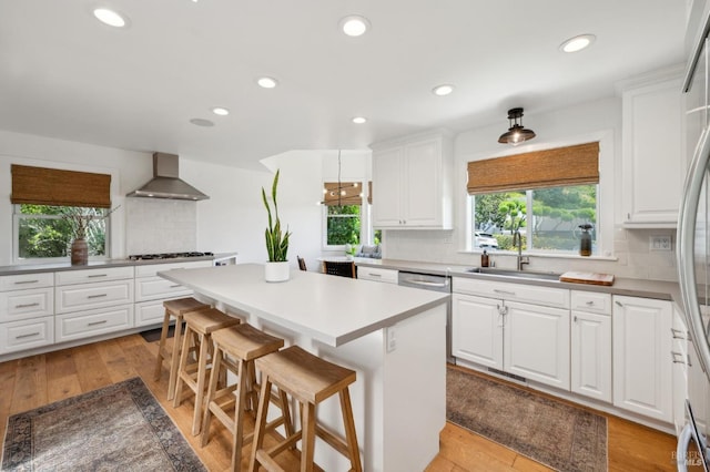 271 Via La Paz Rd, Greenbrae, CA 94904 - kitchen with recessed lighting, a sink, decorative backsplash, wall chimney exhaust hood, and stainless steel appliances