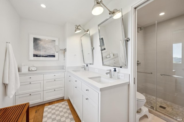 271 Via La Paz Rd, Greenbrae, CA 94904 - full bathroom with a sink, double vanity, a shower stall, and wood finished floors
