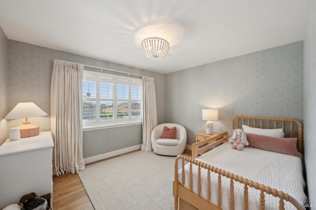 271 Via La Paz Rd, Greenbrae, CA 94904 - bedroom featuring light wood finished floors, wallpapered walls, baseboards, and a notable chandelier