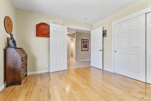 19475 Old Creek Rd, Hidden Valley Lake, CA 95467 - unfurnished bedroom featuring light wood finished floors and baseboards