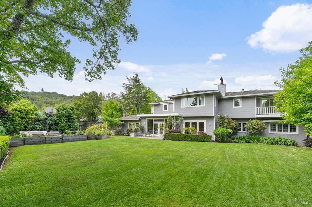 30 Tarry Rd, San Anselmo, CA 94960 - rear view of property featuring a chimney and a lawn