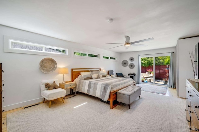 bedroom featuring visible vents, ceiling fan, and access to exterior