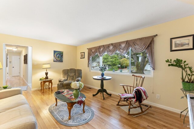 824 W St, Petaluma, CA 94952 - living room featuring light wood finished floors and baseboards