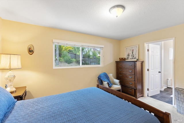 824 W St, Petaluma, CA 94952 - bedroom featuring a textured ceiling and tile patterned flooring