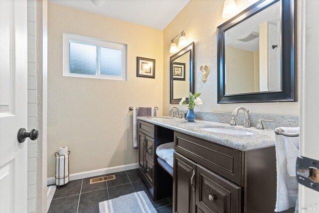 824 W St, Petaluma, CA 94952 - full bath with double vanity and tile patterned floors