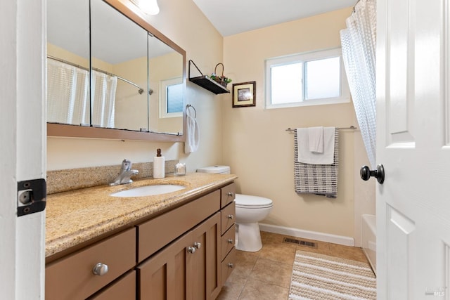 824 W St, Petaluma, CA 94952 - bathroom featuring vanity, toilet, tile patterned flooring, baseboards, and shower / bathtub combination with curtain