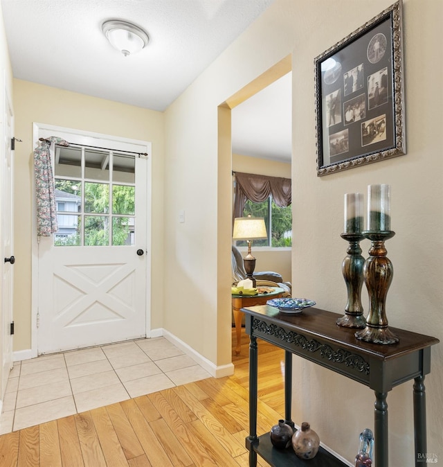 824 W St, Petaluma, CA 94952 - entryway featuring healthy amount of natural light, baseboards, and light tile patterned floors
