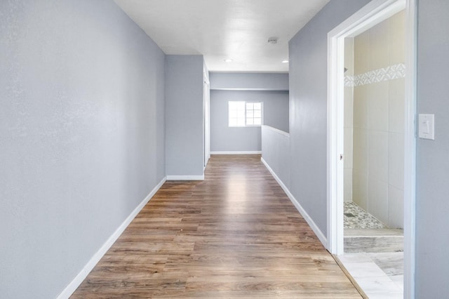 2931 Elm Ave, Merced, CA 95348 - hallway with wood finished floors and baseboards