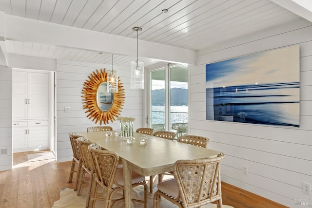 27 W Shore Rd, Belvedere, CA 94920 - dining space with light wood finished floors, wood walls, and wood ceiling