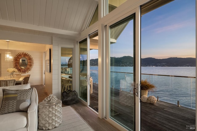 27 W Shore Rd, Belvedere, CA 94920 - sunroom with a water and mountain view, wood finished floors, beamed ceiling, and wooden walls