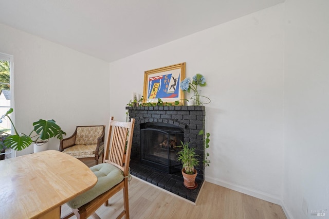 624 N Regatta Dr, Vallejo, CA 94591 - dining space featuring baseboards, a fireplace, and wood finished floors